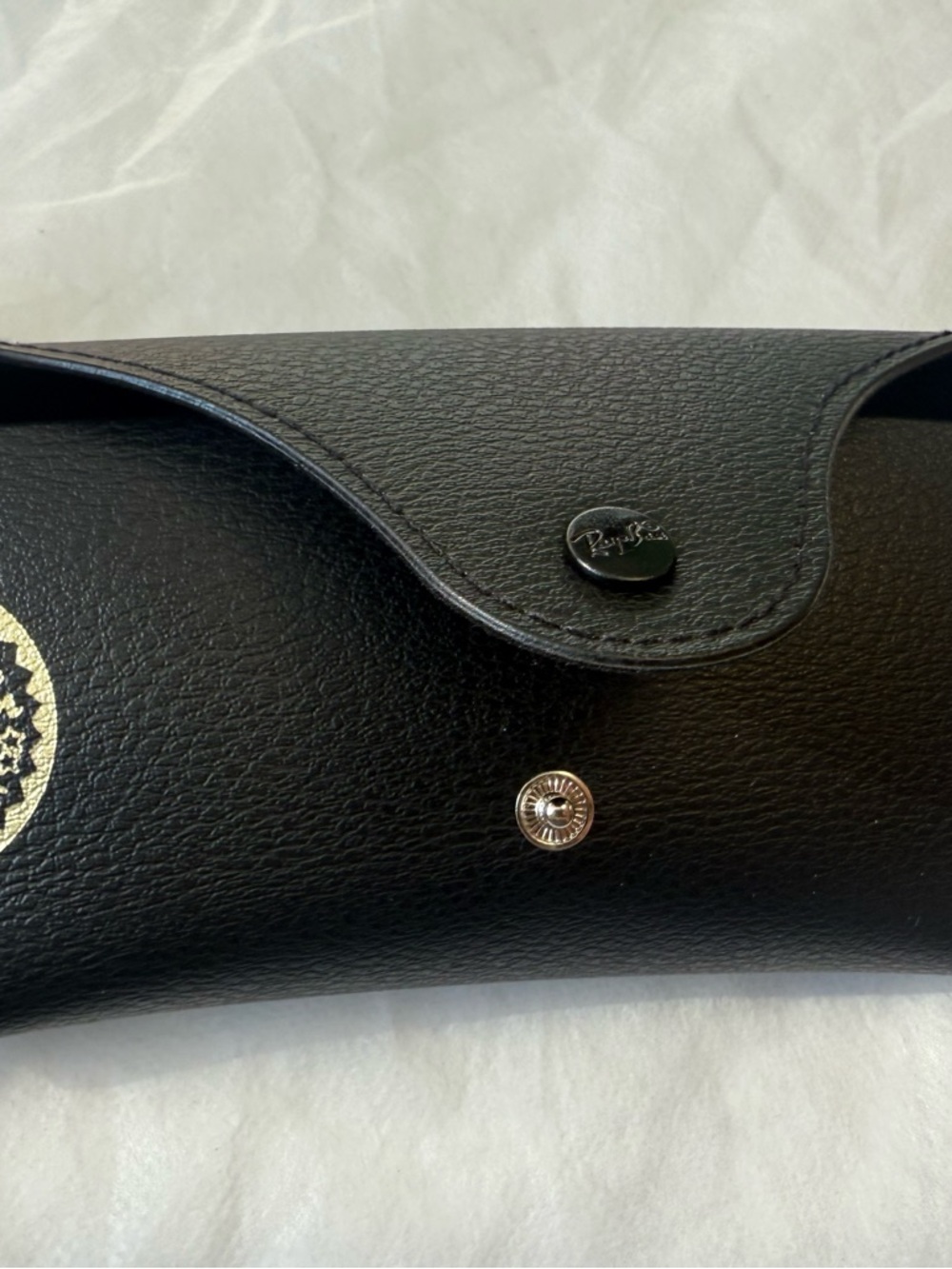 Ray-Bans with case I think men could be for woman also